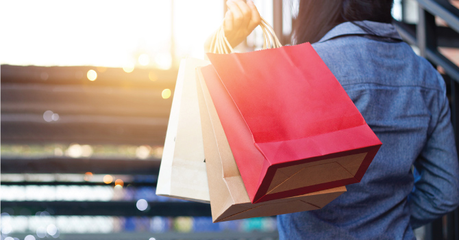 Woman carrying her shopping bags.
