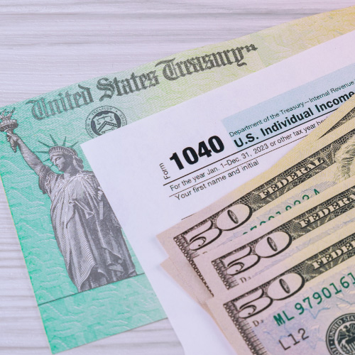 US treasury not along with a 1040 tax form and three fifty dollar bills.