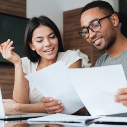 Couple reviewing finances.