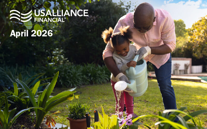 April 2026 a man waters the garden with his daughter.