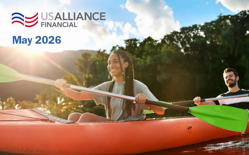 USALLIANCE Logo and the words May 2026 written ontop of two friends kayaking on a lake.