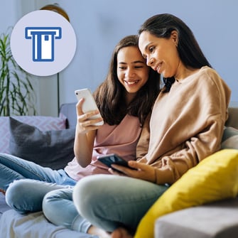 Teenager and mobile viewing information on cellphone.