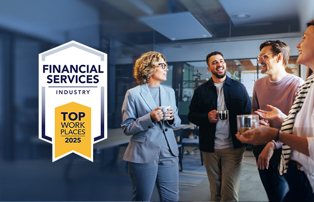 A group of employees talking and smiling. "Financial Services award" badge is on top.